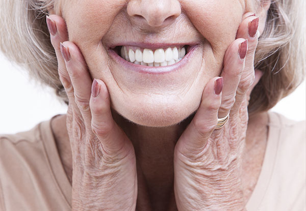 Replace Missing Teeth With Implant Supported Dentures